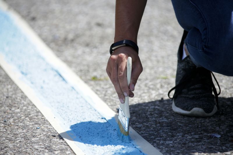 Local Parking Space Painting pros at work